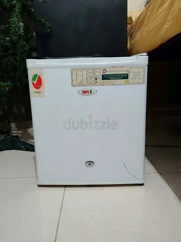 Small single-door mini fridge — used, working