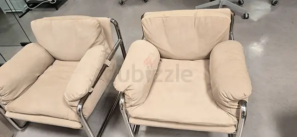 Pair of Beige Upholstered Lounge Chairs with Chrome Frame