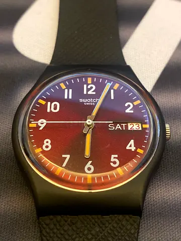 Swatch black rubber wristwatch with day-date function
