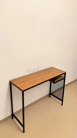 Slim console table with wood top and black metal frame