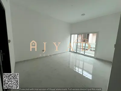 Annual brand new 2BR hall in Al Mowaihat 3 near Saudi German Hospital 2 master rooms 3 baths balcony central AC flexible payment.