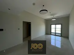 One bedroom and living room, two bathrooms with showers, built-in wardrobes, and a balcony with an o