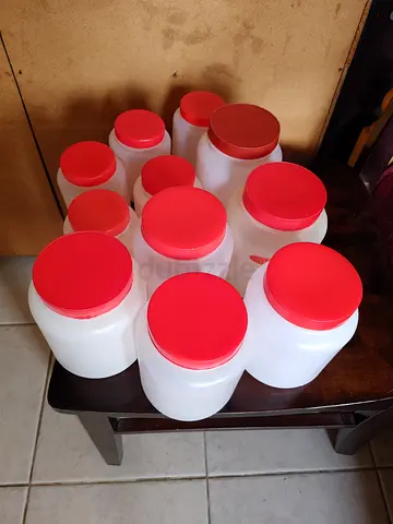 Set of Plastic Storage Jars with Red Lids (9 pieces)