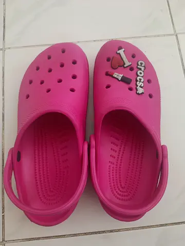 Pink slip-on clog sandals (Crocs-style), size unknown