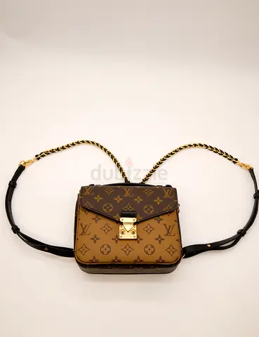 Louis Vuitton Reverse monogram pochette metis backpack - brown/tan