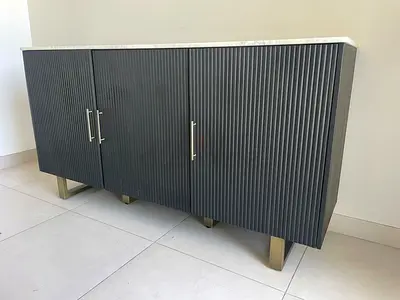 3 door wooden chest of drawers with marble top
