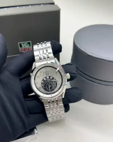 Tag Heuer mens Super Master Copy watch with silver bracelet and visible movement