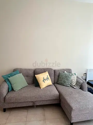 Light grey L-shaped fabric sofa - 3 seater with chaise