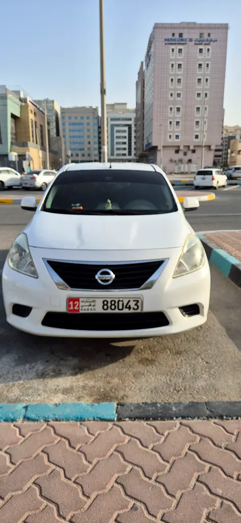 Nissan Sunny 2012 — photo 1 of 4