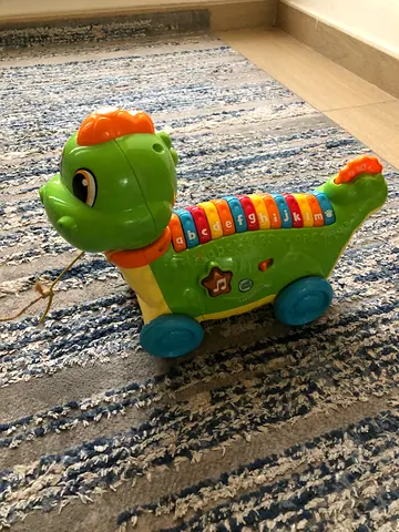 Fisher-Price Musical Walking Dino Toy - Battery Operated, Lights  Sounds
