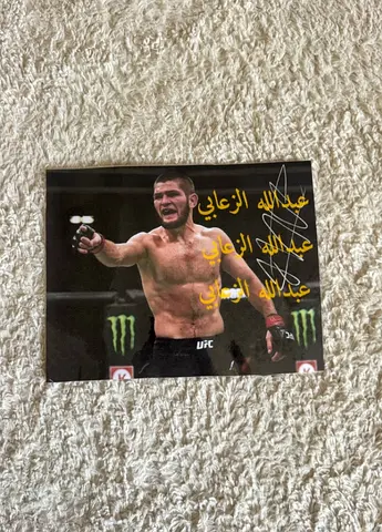 Signed UFC Fighter( Khabib Nurmagomedov )Photo - Autographed Action Shot