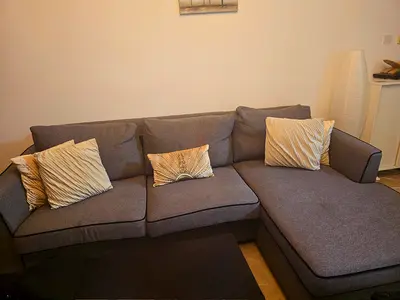 Grey L-shaped Fabric Sofa bed with Chaise - Good Condition