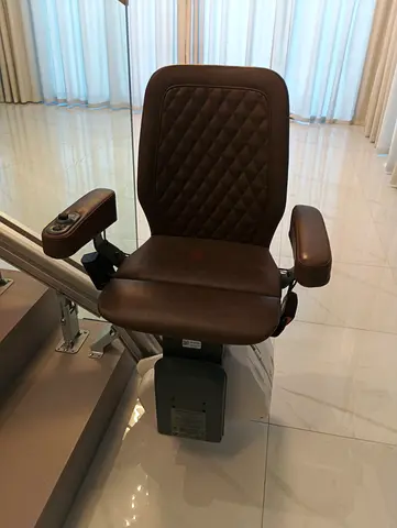 Brown Stairlift Chair - Comfortable Powered Seat for Home Stairs