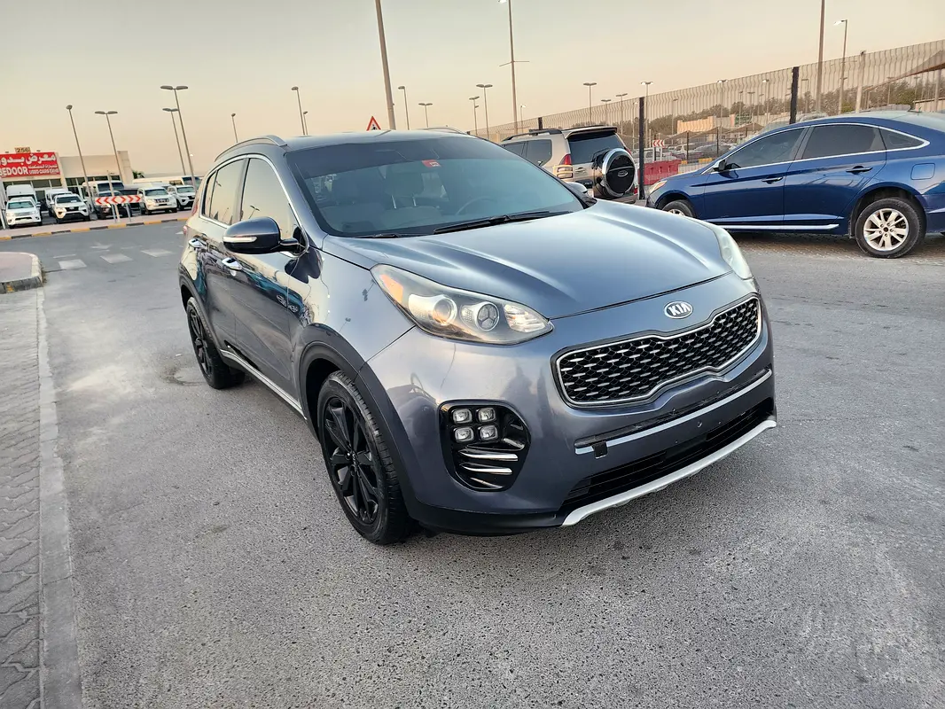 Kia Sportage 2018 — photo 1 of 14