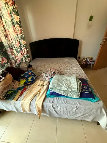 Queen bed frame with headboard and mattress (used)