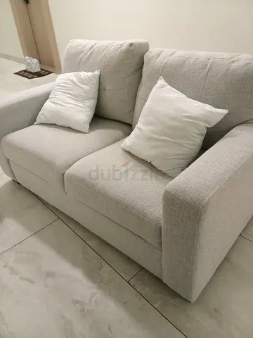 Light Beige 2-Seater Sofa — Good Condition