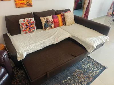Brown ikea L-shaped Sofa Bed with Cushions — excellent Condition, always covered and protected.