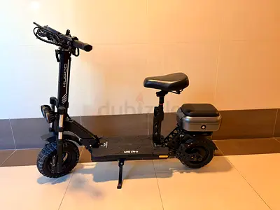 Kugoo M5 Pro Electric Scooter with Seat and Rear Storage - Very Good Condition
