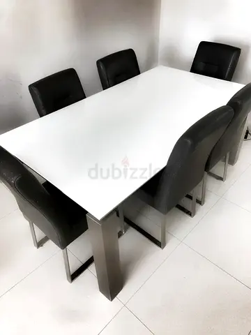 Dining table with 6 leather chairs