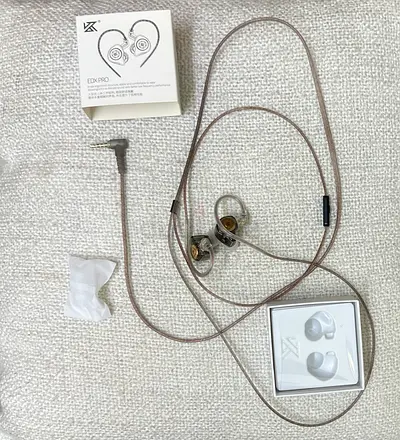 Wired in-ear earphones with ear hooks (used) - includes box and extra tips