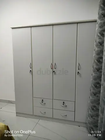 White 4-Door Wardrobe with Drawers - Good Condition