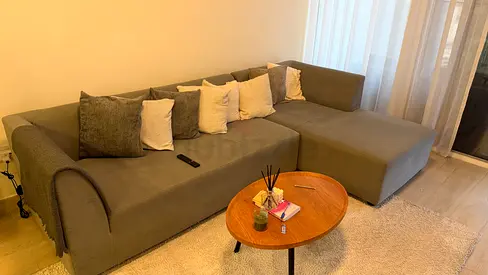 L-shaped grey fabric sofa with chaise (good condition)