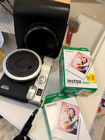 Fujifilm Instax Mini instant camera with case + film (good condition)