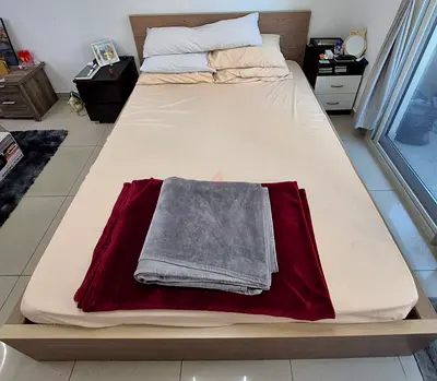 Queen wooden bed frame with mattress and bedside tables (used)