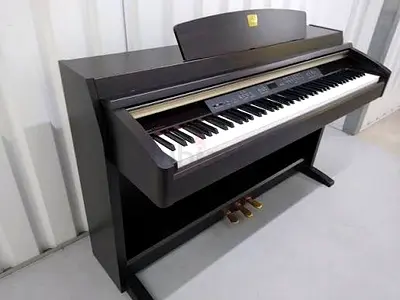 Yamaha Clavinova Clp230 Dark color Having minor scratches. With piano bench. Perfect working.