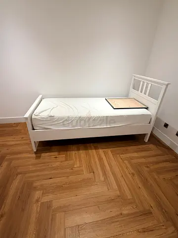 2 piece White Single Wooden Bed Frame with Slatted Headboard. Ikea brand (AED1000/each)