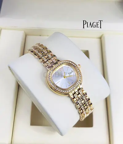 Piaget gold-tone ladies watch with crystal bezel - excellent condition