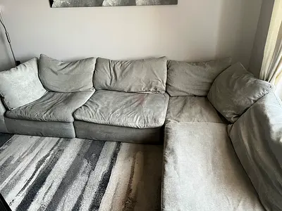 Extremely comfortable light grey L-shaped fabric sofa with chaise - good condition