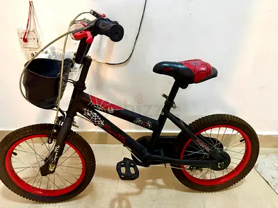 Childrens 16-inch Spider-themed Bike with Front Basket - Good Condition
