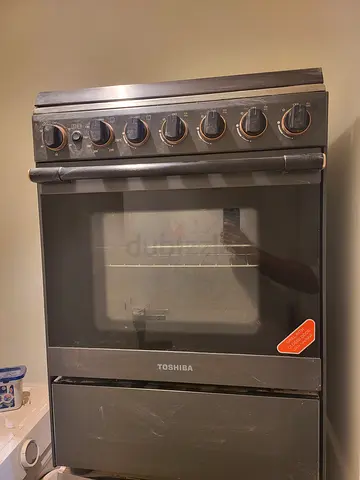 Used Toshiba Freestanding Gas Oven with 4 Burners – Good Working Condition