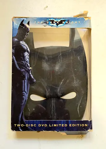 The Dark Knight - Two-Disc Limited Edition DVD (with Collectible BATMAN Mask Stowage Case)