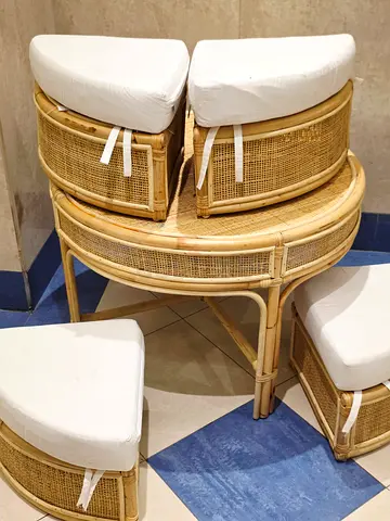 Boho Rattan/Cane Table Set + 4 Nesting Ottoman n Cushions. AED 1,200 Only! Worth Over AED 4K . New!
