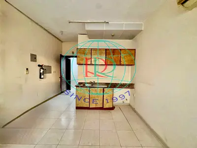 STUDIO FLAT WITH OPEN KITCHEN AND SPLIT A/C AVAILABLE IN AL MUWAILEH AREA OPPOSITEN OF AL ZAHIA CITY CENTRE