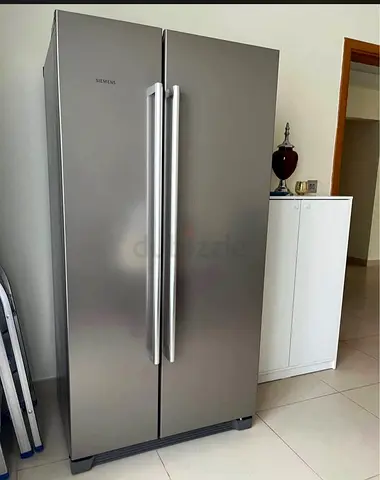 Siemens side by side refrigerator, neat and clean , excellent condition arrange warranty, same like