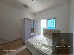 One bedroom and living room for annual rent in Ajman, City Towers, opposite Grand Mall and next to S