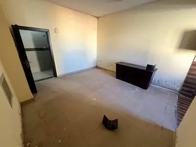 Studio for annual rent in Al Rashidiya, Ajman - AED 20,000. Includes separate kitchen and central a