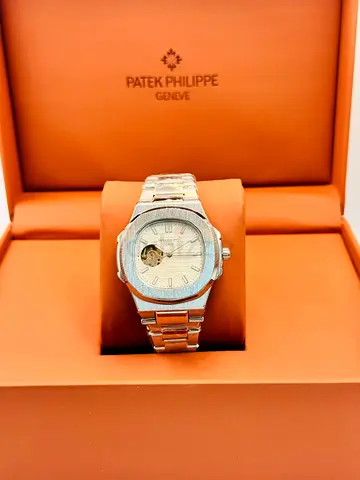 Patek Philippe Nautilus-style stainless steel automatic watch in original box