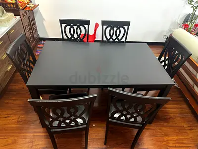 Black Dining Table with 6 Leather Chairs, Two Chairs needs to be fixed