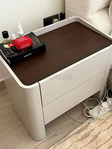 Modern light grey bedside table with drawer and dark wood top
