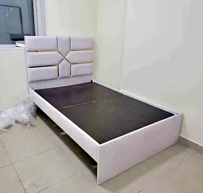 Single bed frame with padded geometric headboard - white