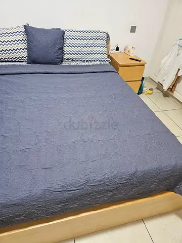 Queen wooden bed frame with mattress and bedside table - light wood