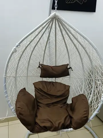 White Rattan Egg Hanging Chair with Brown Cushions