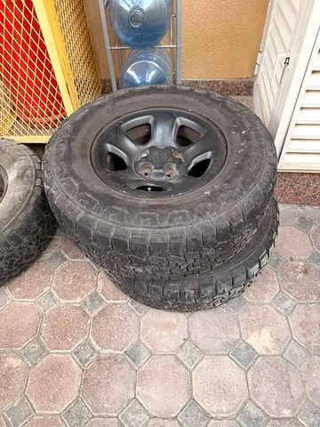 4x Dodge Ram 17” OEM Rims + 285/70R17 A/T Tires (2023)