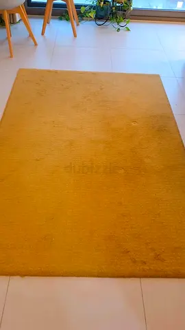 Used mustard yellow rectangular rug - medium size