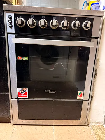Used Super General Freestanding Gas Oven and Stove - 4 Burners