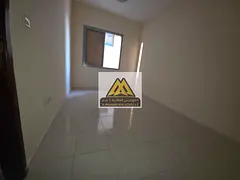 A spacious 1-bedroom apartment available for annual rent in Al Nuaimiya 1, Ajman, featuring a separa
